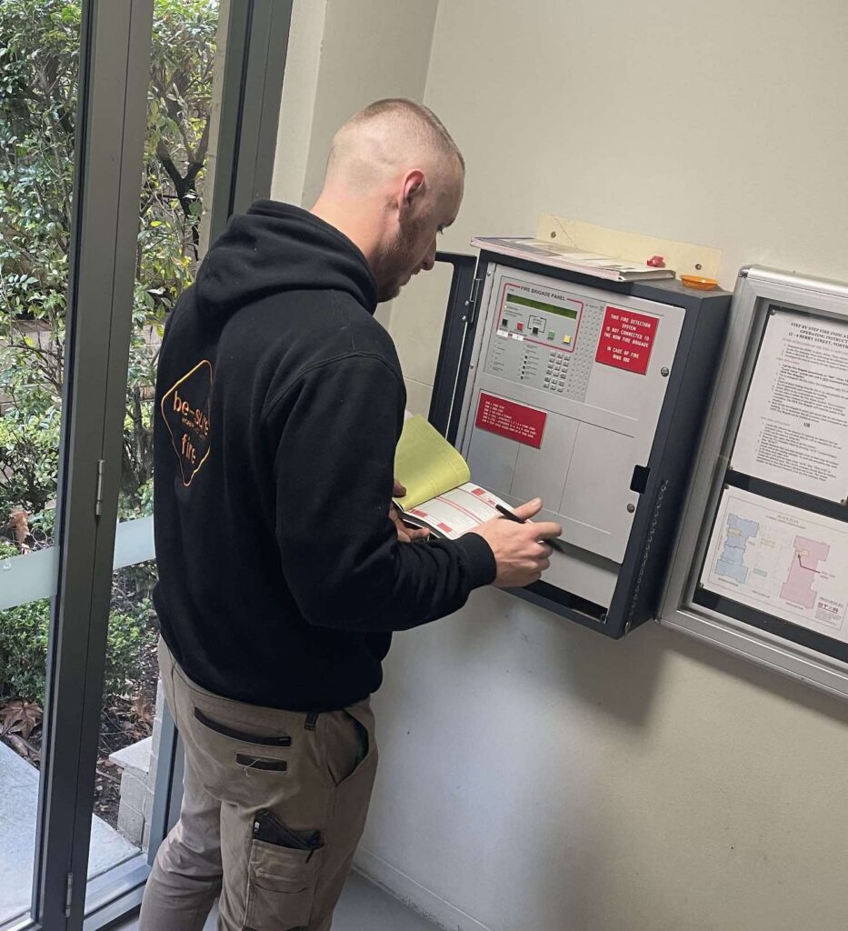 a man inspecting fire safety on the central coast